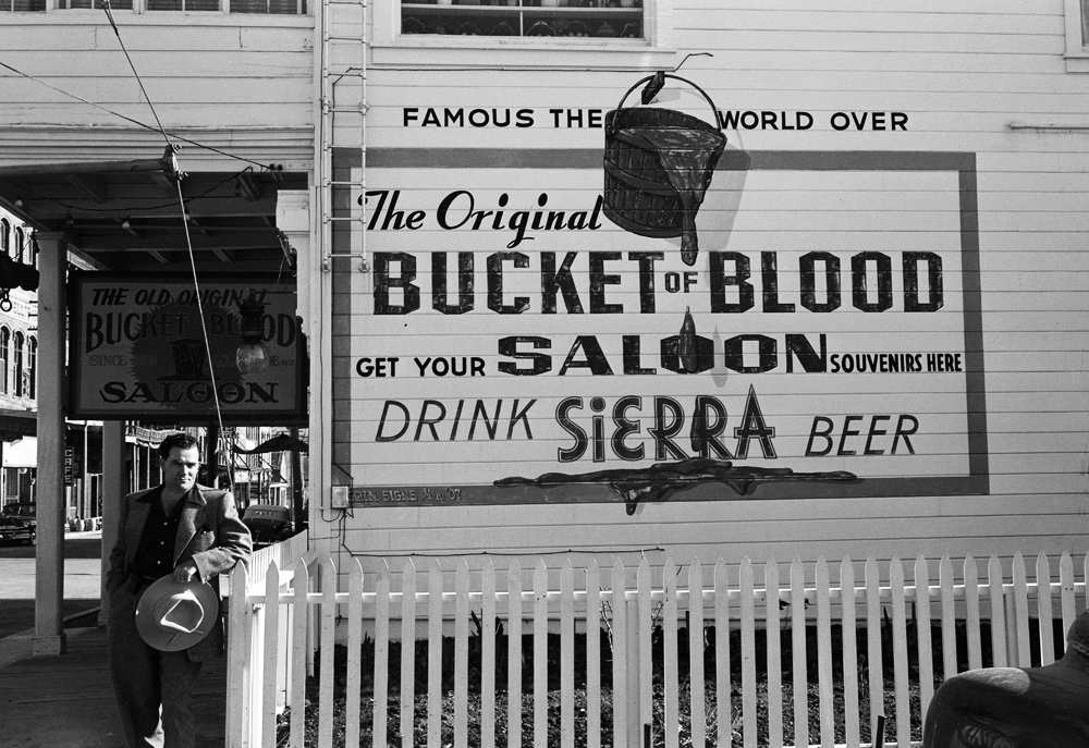 Researching Comstock Lode, Louis stands outside the Original Bucket of Blood Saloon.