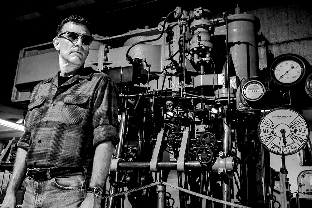 Beau L'Amour and the ship's engine used in the movie The Sand Pebbles.  Doing research for No Traveller Returns.  Photo by Thanakorn Telan.