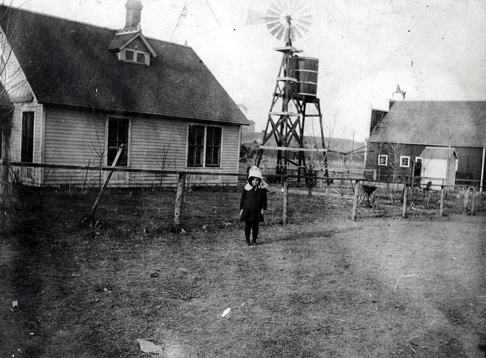 Edna LaMoore, Louis' older sister. Note relationship of house to Veterinary Barn on right. Related to the Louis L'Amour's Lost Treasures Volume 1 story SAMSARA